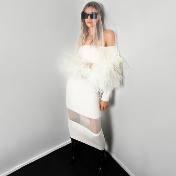 Woochic robe à plumes tricotée col bateau tulle dos nu